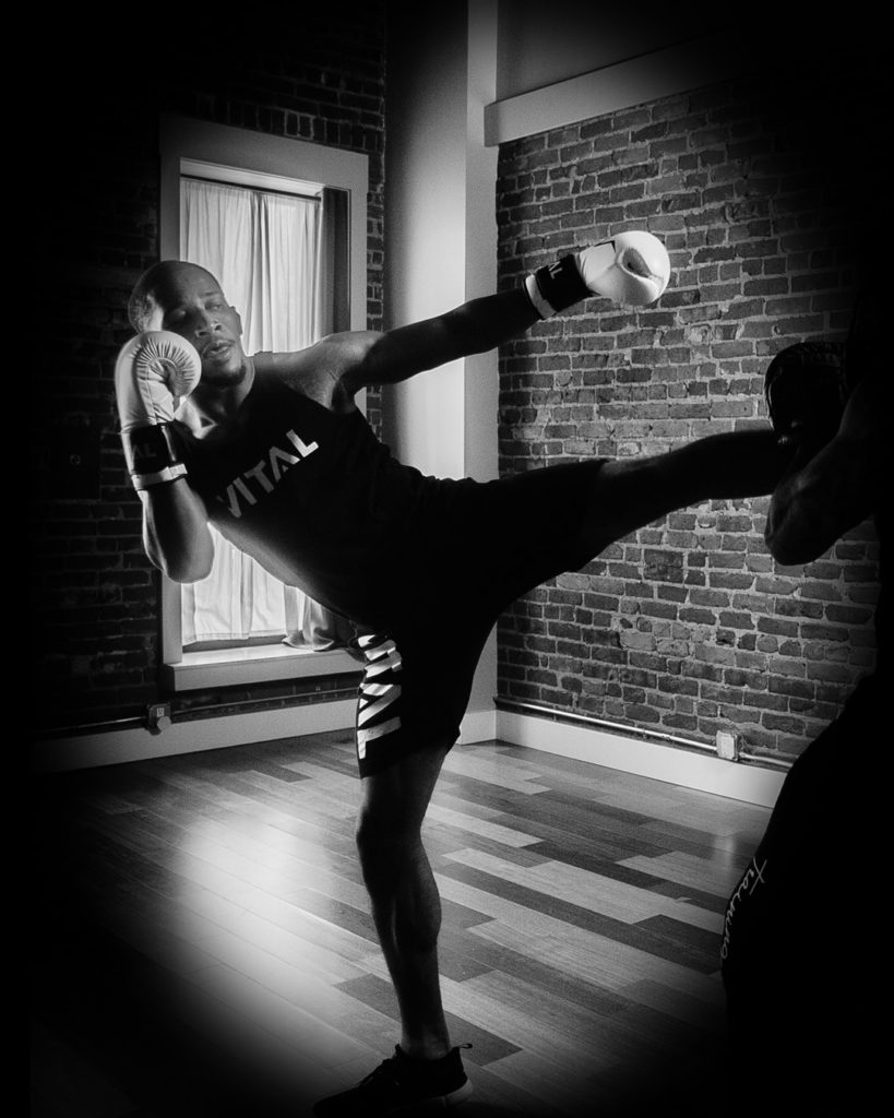 Vital Training Systems coach LeVille doing kickboxing